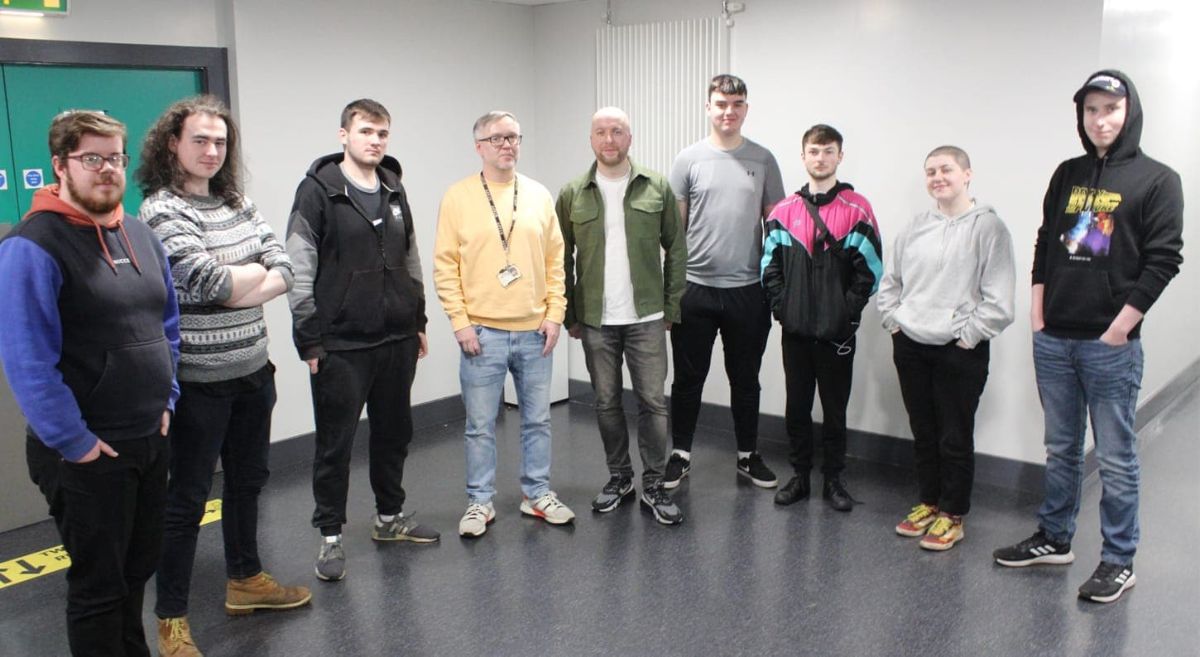 DJ (Middle) with Level 3 Creative Media Students and lecturer